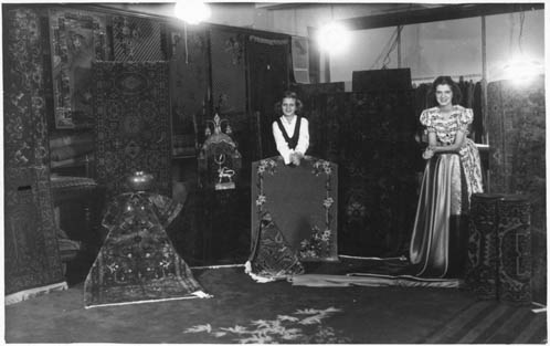 Girls posed with rugs in the second Ottawa store of Armenian-Canadian Setrak Tatarian, The Orient Rug Cleaners, 1103 Bank St.