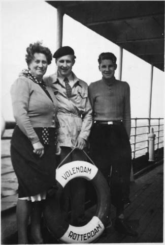 A Dutch woman and her two sons on the S.S. Volendam enroute to  Canada
