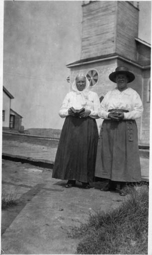 Mrs. Johnson and Mrs. Svensk in front of the Copper Cliff Lutheran Church