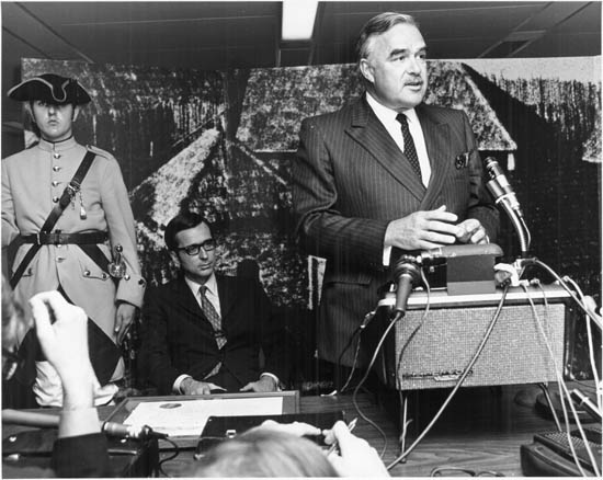 Premier John Robarts speaking at the Heritage Project, Ste. Marie Descendants Program, Montreal [Quebec Premier Robert Bourassa seated in the background]