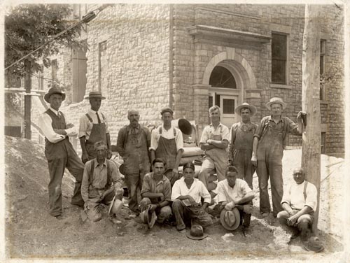 Workers pose in front of old Drouillard property on Brock Street, Amherstburg