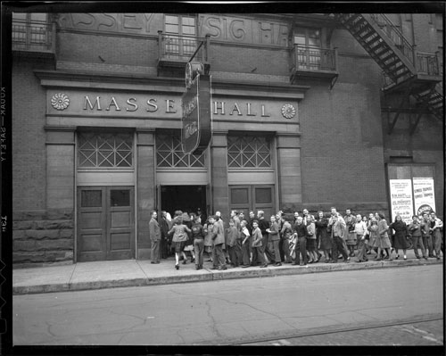 Historic photo from Friday, November 7, 1947 - People lined up along Shuter Street outside Massey Hall in Garden District