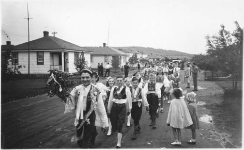 Annual Czech May celebration procession of people wearing traditional costumes, Batawa