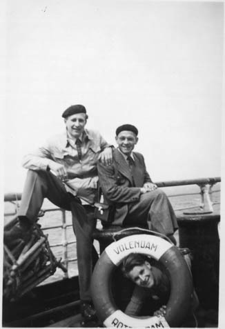 Three Dutch immigrants on the boat the S.S. Volendam enroute to Canada