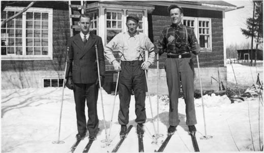Cross country skiers in front of the Finnish Organization of Canada Beaver Lake Finnish Hall