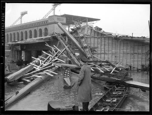 Historic photo from Monday, May 20, 1940 - May 19th storm damage at the Don Rowing Club with Maple Leaf Baseball stadium in background in Harbourfront